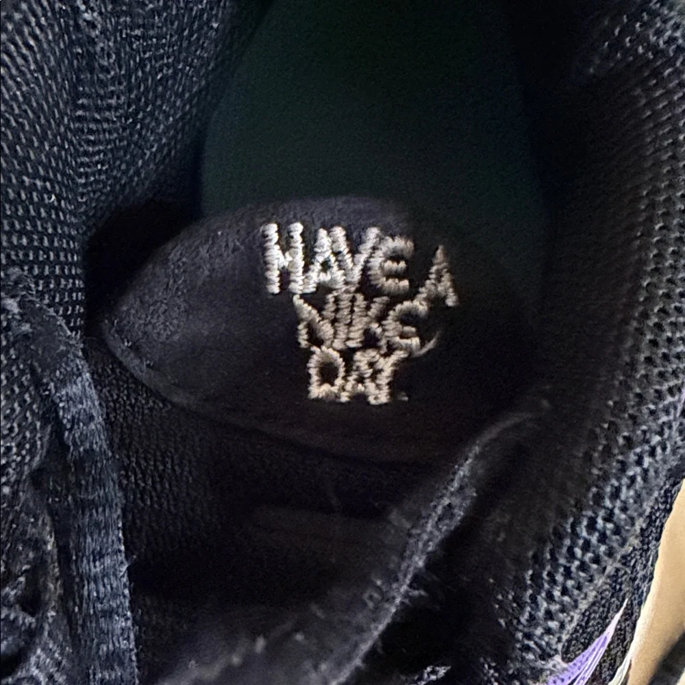 Nike Kids Black Sneakers with Iridescent Purple Accents